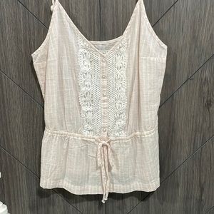Light pink top with cute white bordering